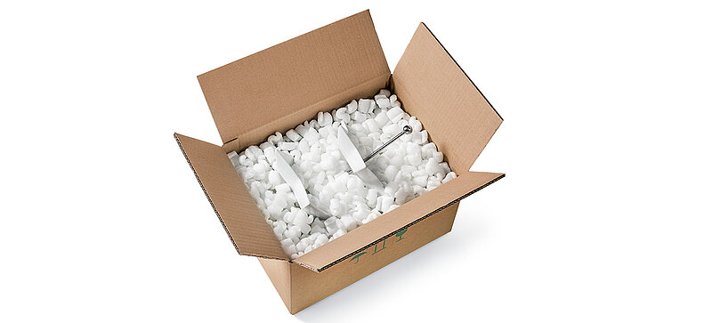 Un carton contenant une étagère et des chips d’emballage en bioplastique en forme de S